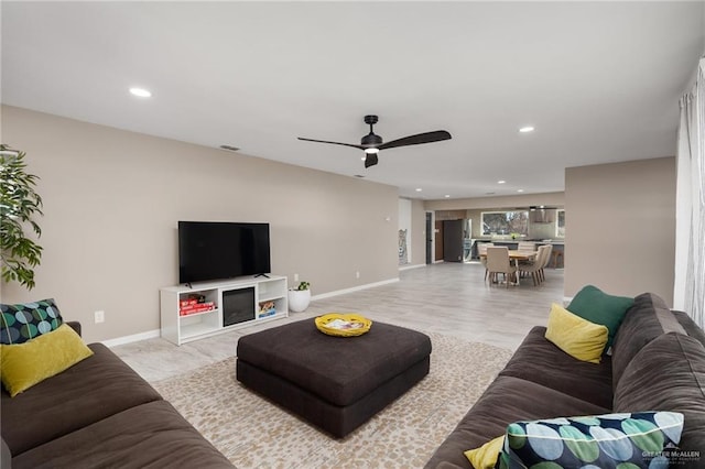 living room with ceiling fan