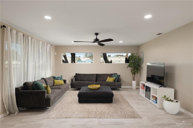 living room featuring ceiling fan