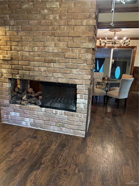 room details with a fireplace and wood-type flooring