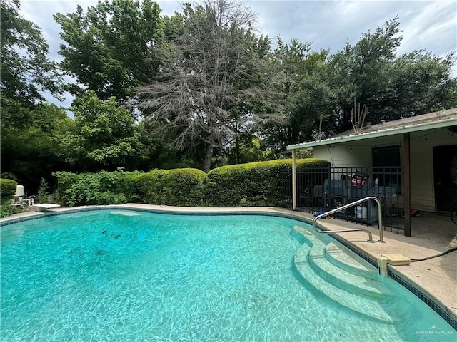 view of pool with a patio area