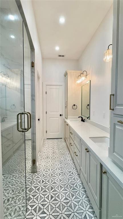 bathroom featuring vanity and walk in shower