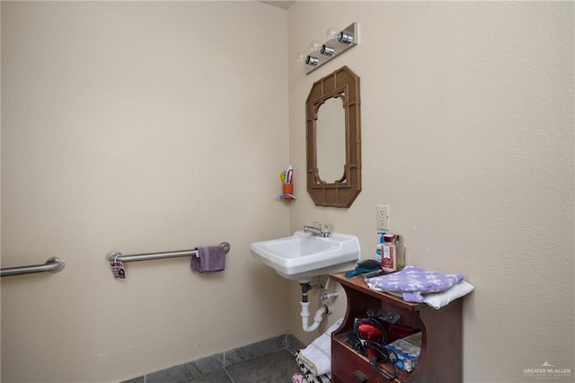 bathroom featuring sink and tile patterned floors