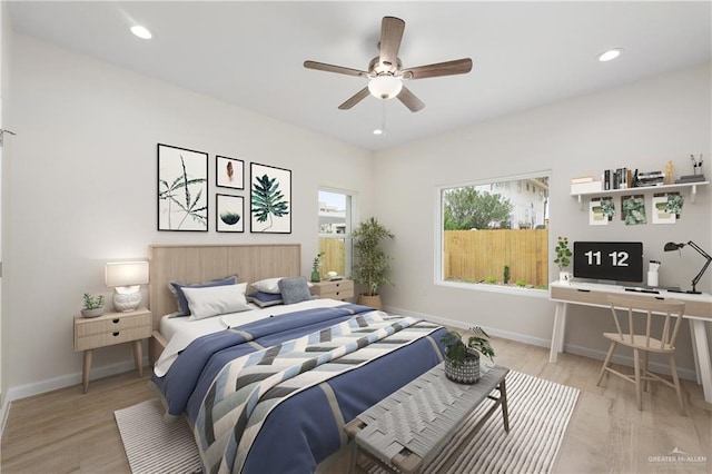 bedroom featuring ceiling fan and light hardwood / wood-style flooring