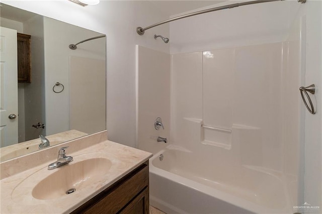 bathroom with vanity and shower / tub combination