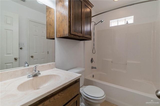 full bathroom featuring shower / washtub combination, toilet, and vanity