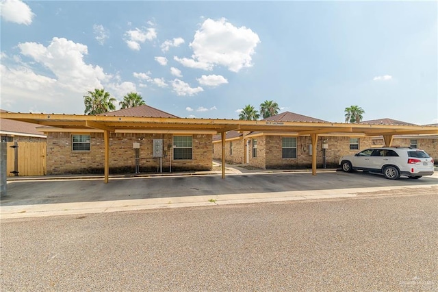 ranch-style home with a carport