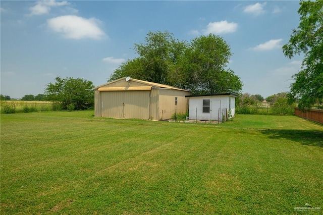 26086 Rabb Rd, La Feria, TX 78559 - view of yard featuring an outdoor structure and an outbuilding