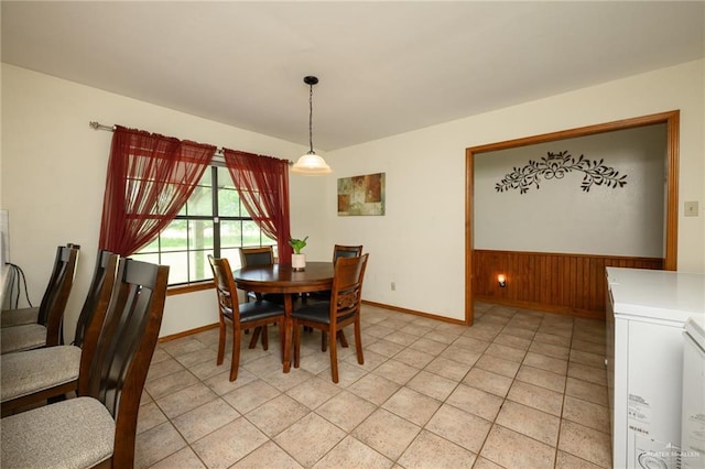 26086 Rabb Rd, La Feria, TX 78559 - dining space featuring baseboards and wooden walls