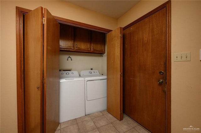 26086 Rabb Rd, La Feria, TX 78559 - washroom with washing machine and clothes dryer, cabinet space, and light tile patterned floors