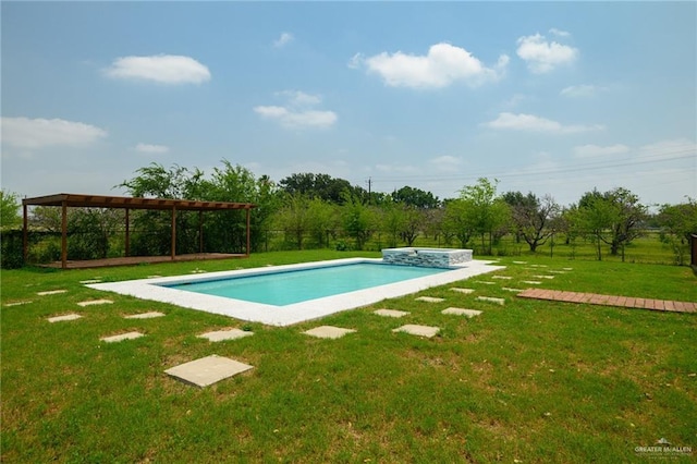 26086 Rabb Rd, La Feria, TX 78559 - view of swimming pool with a lawn and a pool with connected hot tub
