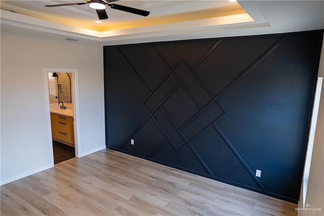 800 W Ruisenor Ave, Pharr, TX 78577 - empty room with a tray ceiling, a ceiling fan, light wood-type flooring, and recessed lighting