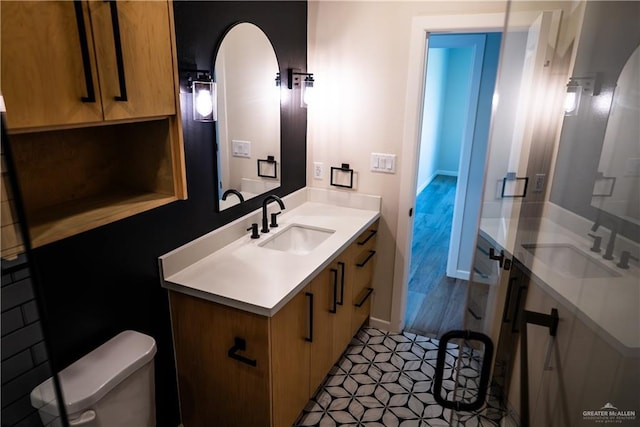800 W Ruisenor Ave, Pharr, TX 78577 - bathroom with vanity and tile patterned flooring