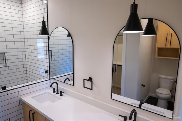 800 W Ruisenor Ave, Pharr, TX 78577 - full bathroom featuring toilet and double vanity
