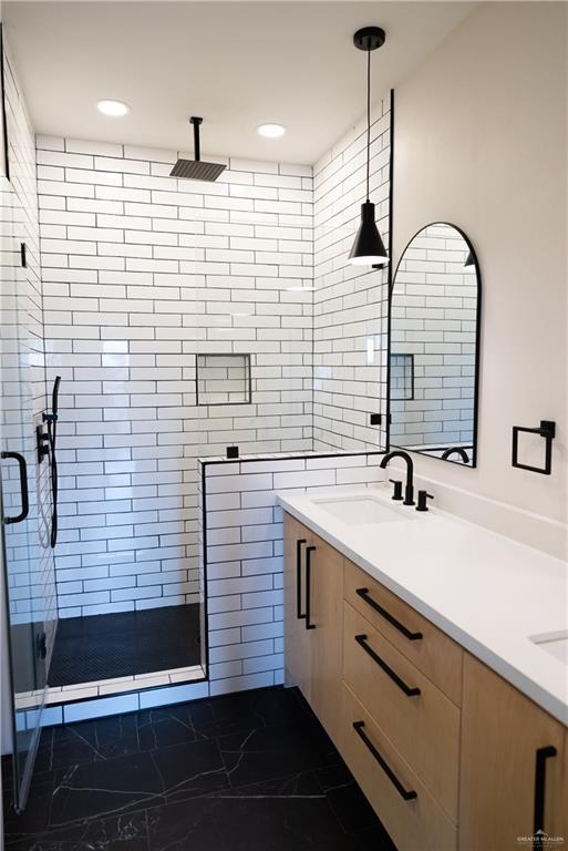 800 W Ruisenor Ave, Pharr, TX 78577 - full bath featuring double vanity, a stall shower, marble finish flooring, and recessed lighting