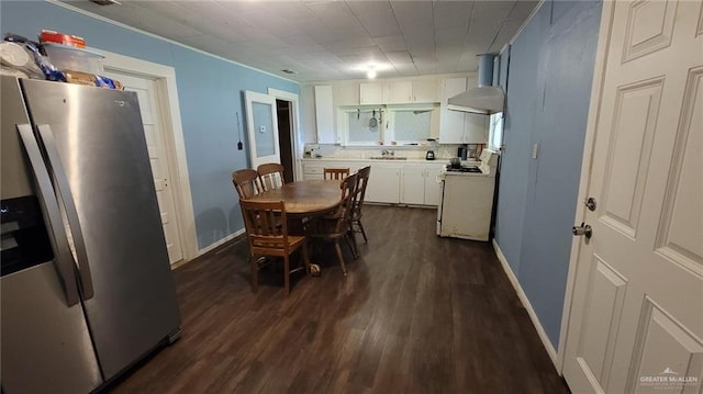 4700 W Mile 4 Rd, Mission, TX 78574 - dining area featuring dark wood-type flooring and crown molding
