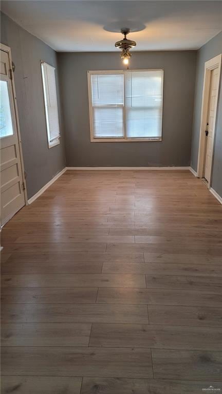 spare room featuring hardwood / wood-style flooring