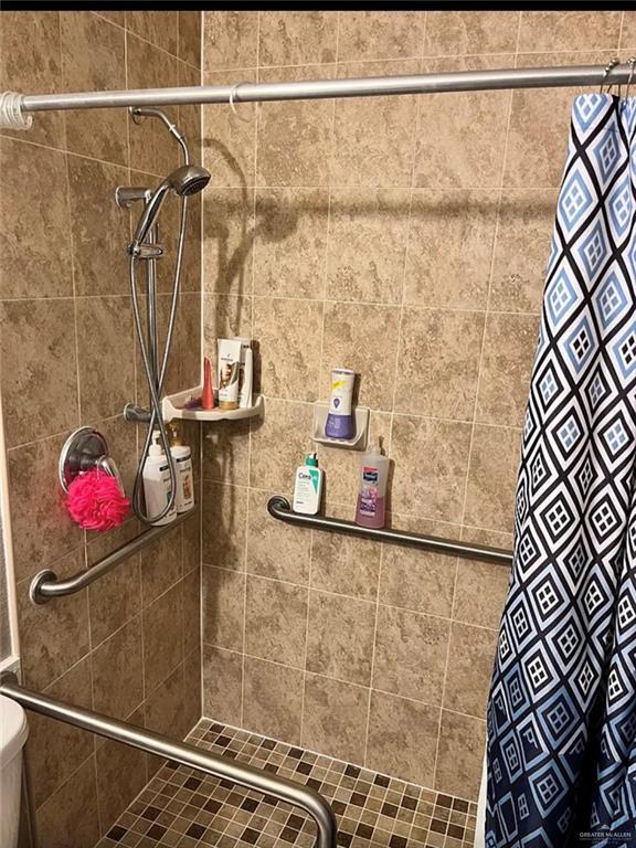 bathroom featuring a stall shower