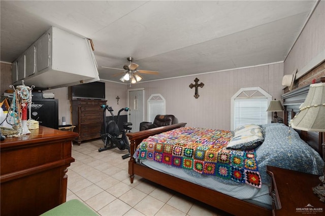 tiled bedroom with ceiling fan