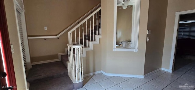 1706 Primrose Ave, Mission, TX 78572 - stairs with tile patterned floors, ceiling fan, and baseboards
