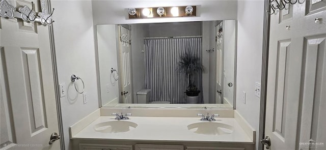 1706 Primrose Ave, Mission, TX 78572 - bathroom featuring double vanity