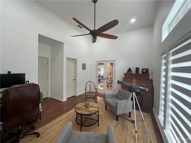 home office featuring a high ceiling, a ceiling fan, french doors, and a healthy amount of sunlight