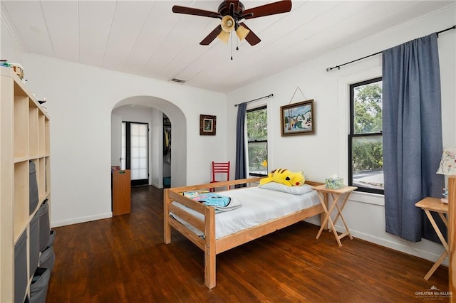 902 N 15th St, Mcallen, TX 78501 - bedroom featuring arched walkways, wood finished floors, ceiling fan, and crown molding