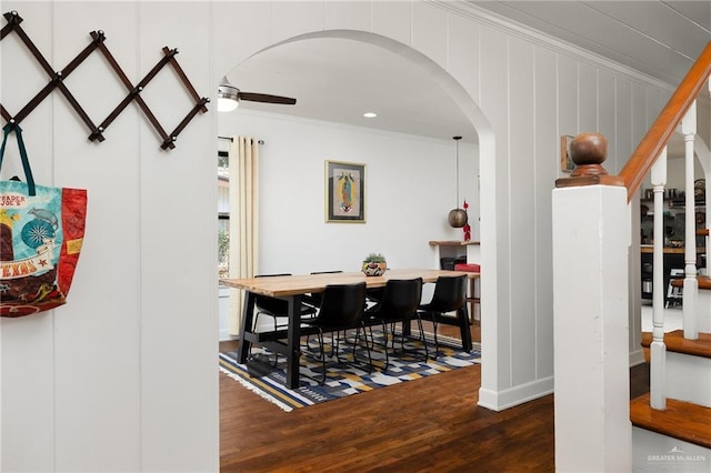 902 N 15th St, Mcallen, TX 78501 - dining area featuring arched walkways, crown molding, and wood finished floors