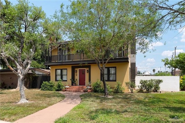 902 N 15th St, Mcallen, TX 78501 - view of front of house with a balcony and stucco siding