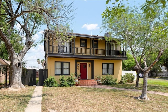 902 N 15th St, Mcallen, TX 78501 - view of front facade with a balcony and stucco siding
