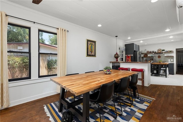 902 N 15th St, Mcallen, TX 78501 - dining space with wood finished floors, ornamental molding, and recessed lighting
