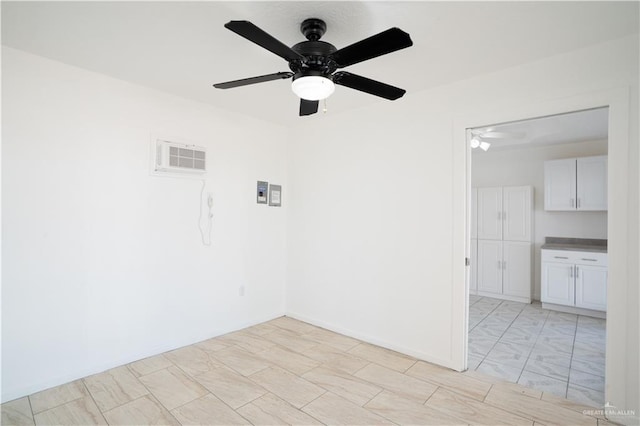 unfurnished room featuring ceiling fan