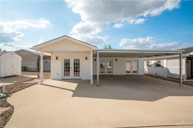 back of property with french doors