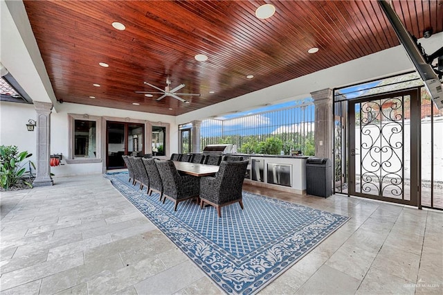 view of patio / terrace with area for grilling and ceiling fan