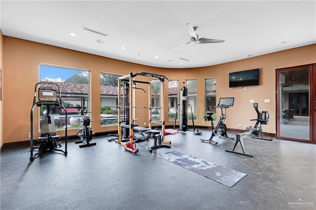 workout area with ceiling fan