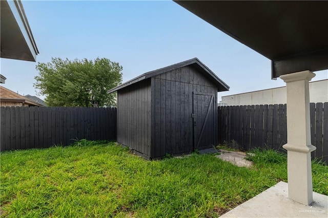 1711 Esperanza Ave, Hidalgo, TX 78557 - view of shed featuring a fenced backyard