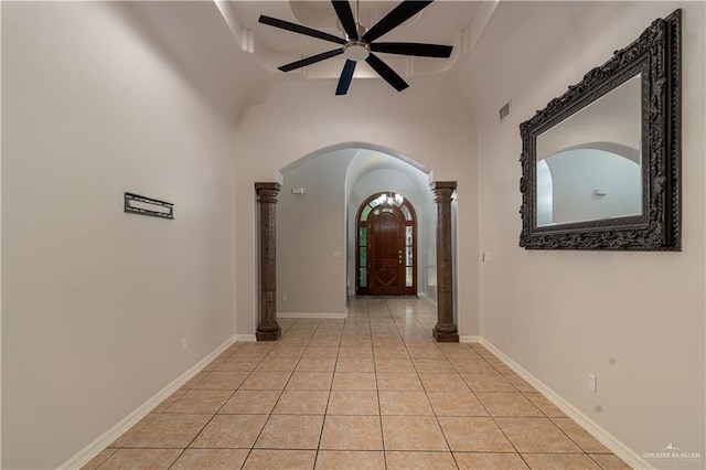 1711 Esperanza Ave, Hidalgo, TX 78557 - hall with arched walkways, decorative columns, and light tile patterned flooring