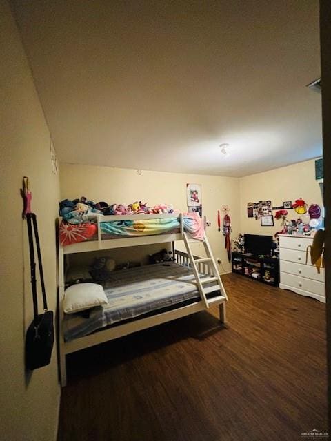 bedroom featuring dark hardwood / wood-style floors