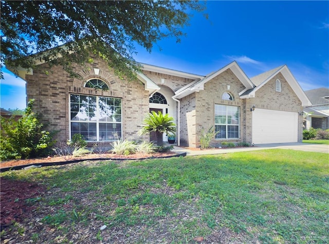 3004 San Federico Rd, Mission, TX 78572 - single story home with concrete driveway, a front lawn, brick siding, and a garage