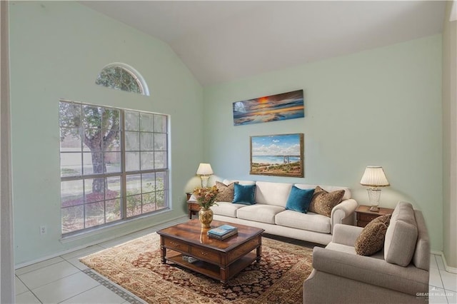 3004 San Federico Rd, Mission, TX 78572 - living room featuring high vaulted ceiling, plenty of natural light, baseboards, and light tile patterned floors