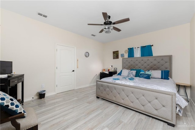 bedroom featuring light wood-type flooring and ceiling fan