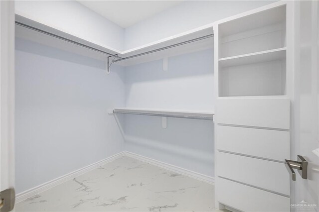 1232 Bridle Way, San Benito, TX 78586 - spacious closet with light marble finish flooring