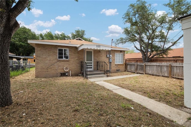 816 E 12th St, Mission, TX 78572 - back of property with brick siding