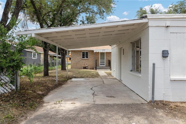 816 E 12th St, Mission, TX 78572 - view of patio with entry steps and a carport