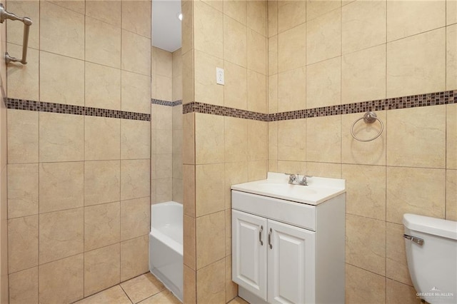 816 E 12th St, Mission, TX 78572 - bathroom featuring tile walls, vanity, tile patterned flooring, and shower / washtub combination