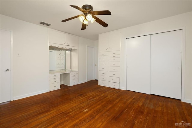 816 E 12th St, Mission, TX 78572 - unfurnished bedroom with wood-type flooring, a ceiling fan, a desk, and a closet
