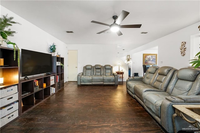 living room featuring dark hardwood / wood-style flooring and ceiling fan