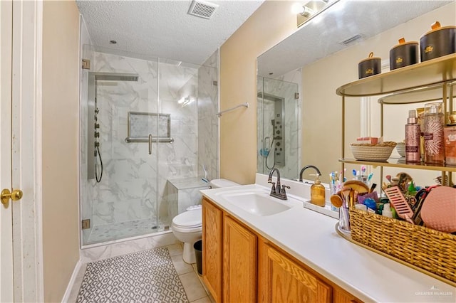 bathroom with tile patterned flooring, a textured ceiling, toilet, vanity, and a shower with shower door