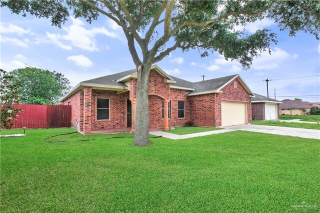 5302 Huisache Ave, Pharr, TX 78539 - single story home featuring brick siding, driveway, a garage, and roof with shingles