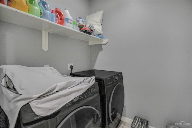 5302 Huisache Ave, Pharr, TX 78539 - laundry room with washer and dryer and baseboards