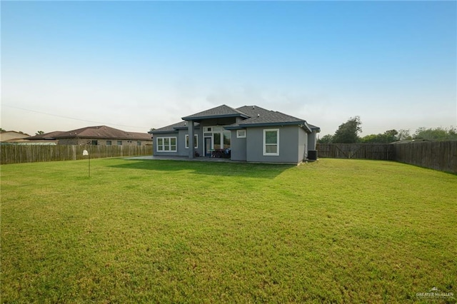 1102 Palm Blvd, Laguna Vista, TX 78578 - rear view of house with stucco siding, cooling unit, and roof with shingles